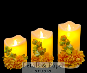 Set of three LED candles (4, 5, and 6 inches) with yellow foam flowers and green foliage, perfect for home décor, Valentine's Day, and gifting, packaged in a transparent plastic box bag.