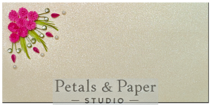 Handcrafted 7 x 3.5-inch pearl-textured envelope featuring quilled pink flowers, green leaves, teardrop accents, pearls, and gems, perfect for gifting money or cards for weddings and special occasions.