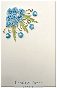 Handmade quilled greeting card with blue roses and pearl embellishments – 5x3 inch blank floral card for birthdays, anniversaries, and special occasions.