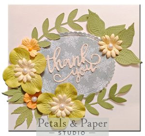 Handmade thank you card with layered pastel paper flowers, green botanical leaves and pearl embellishments