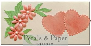 Handcrafted quilled floral envelope with pink paper flowers, green leaves, pearl embellishments and decorative heart shapes – luxury handmade gift envelope for weddings and special occasions