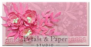 Handcrafted quilled envelope with layered pink paper flowers, botanical leaf accents and decorative border – luxury handmade gift envelope for weddings and special occasions