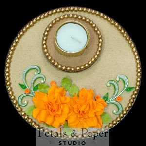 Handmade marigold orange floral tea light plate with golden bead border and quilling design